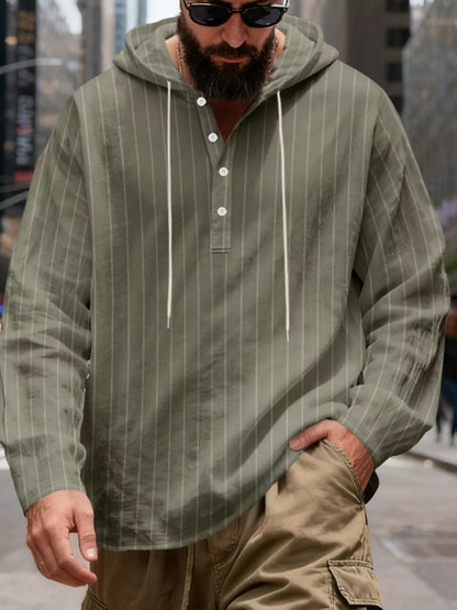 Men's striped Henley hoodie in Army Green — front view showing the hood and buttoned neckline; trousers and accessories are styling only.