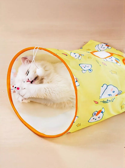 Close-up of the Rabbit Pattern tunnel entrance with a cat inside