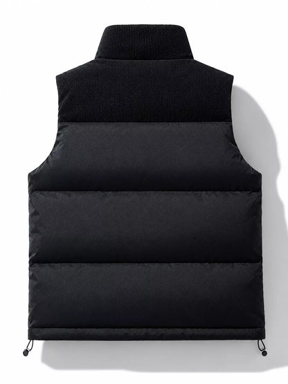 Black men's corduroy-panel puffer vest, back view. One vest is sold.