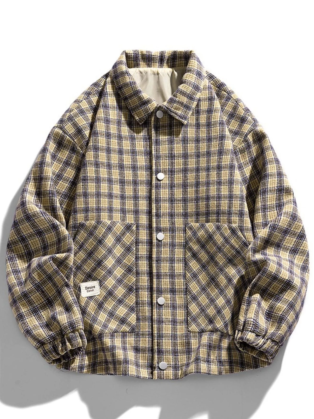 Khaki plaid button-front jacket with two front pockets, front view.