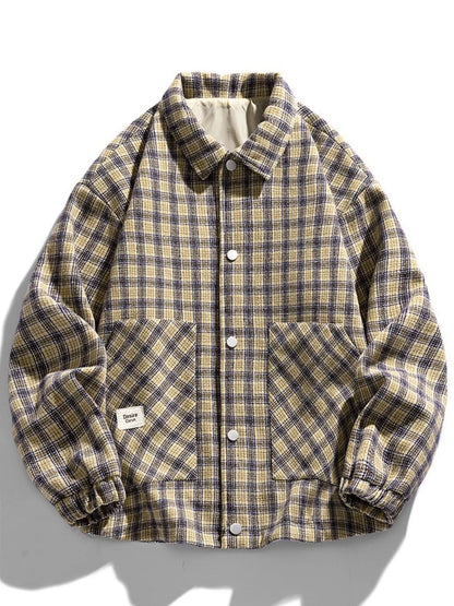Khaki plaid button-front jacket with two front pockets, front view.