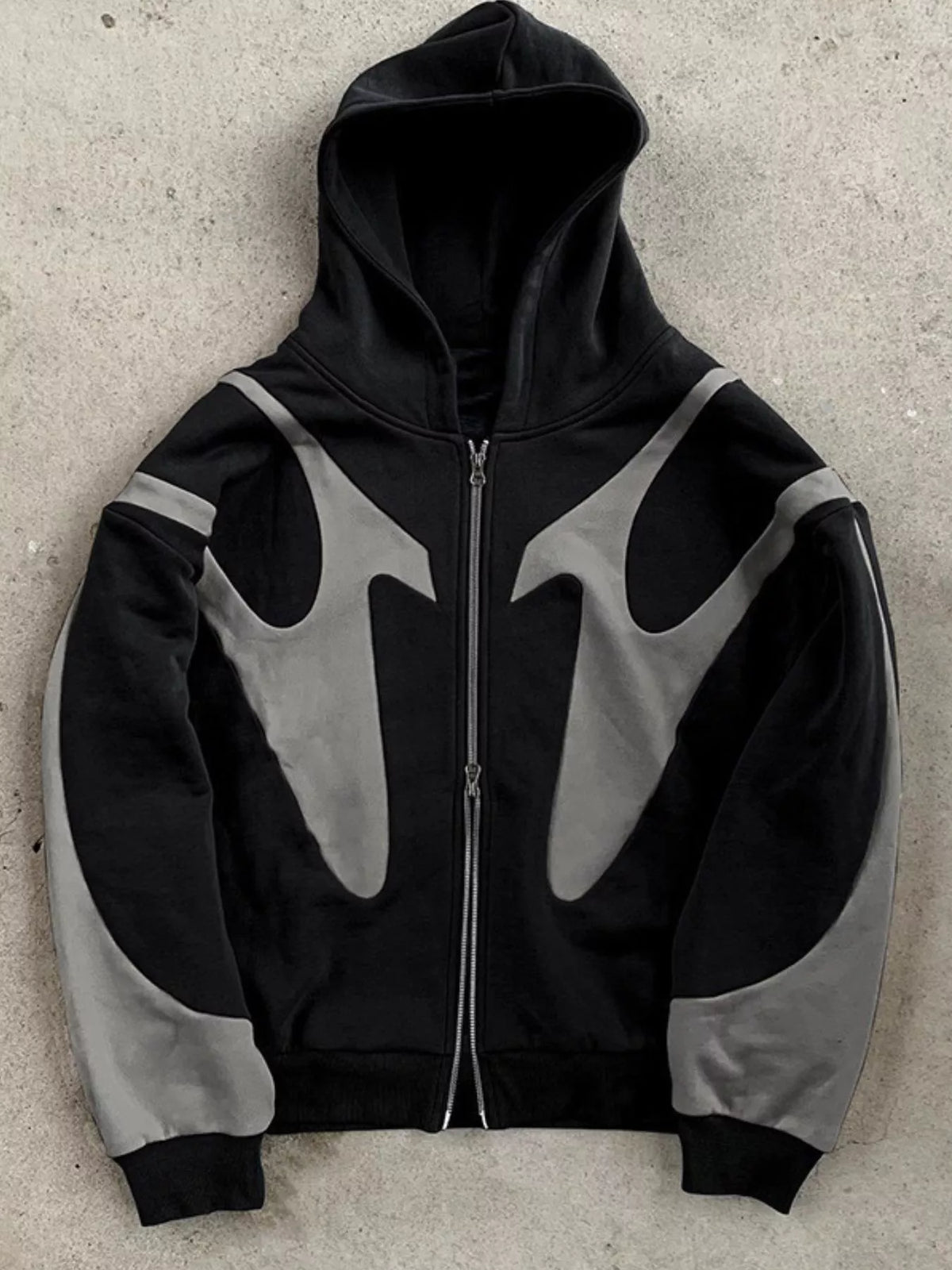 Black and gray oversized full-zip hoodie, front flat lay