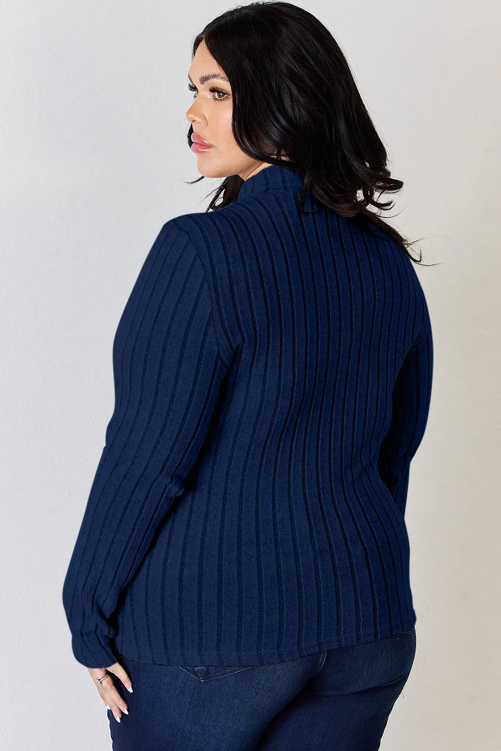 Dark Blue ribbed mock-neck long-sleeve top, product view; one top included, jeans and accessories excluded