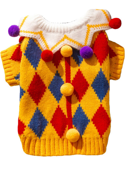 Yellow diamond-pattern pet sweater with colorful pom-pom details, shown flat.