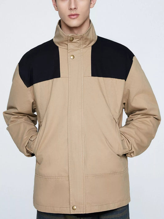 Khaki two-tone men's jacket shown closed from the front, with dark shoulder panels and a stand collar.