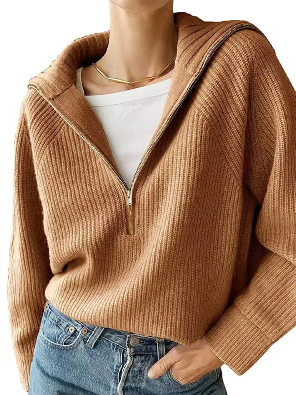 Half-zip long-sleeve ribbed sweater with a high collar.