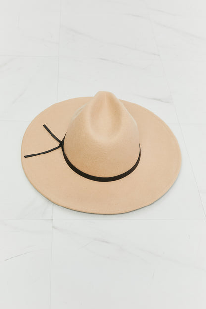 Beige Fame fedora with black band, angled view