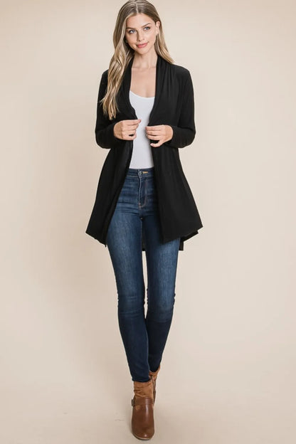 Black open-front cardigan, full-length styling view; top, jeans, shoes and jewelry excluded