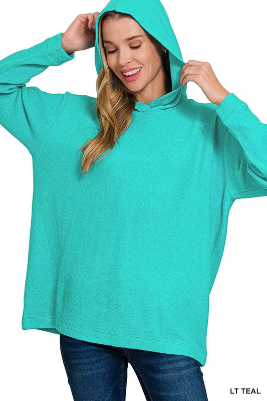 Front view of the light-teal Zenana Hacci sweater with the hood raised; sweater only.