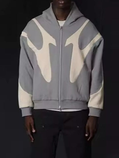 Gray and cream oversized zip hoodie worn from the front