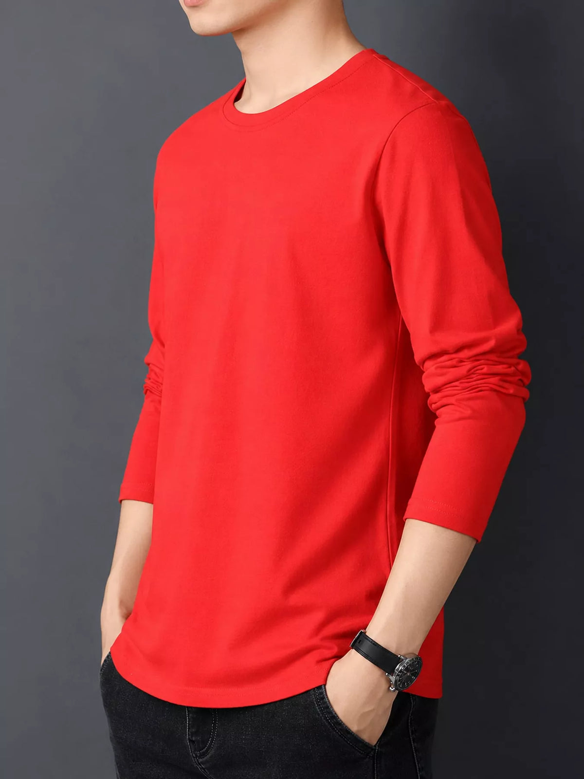 Red men's cotton long-sleeve crewneck tee, side view.