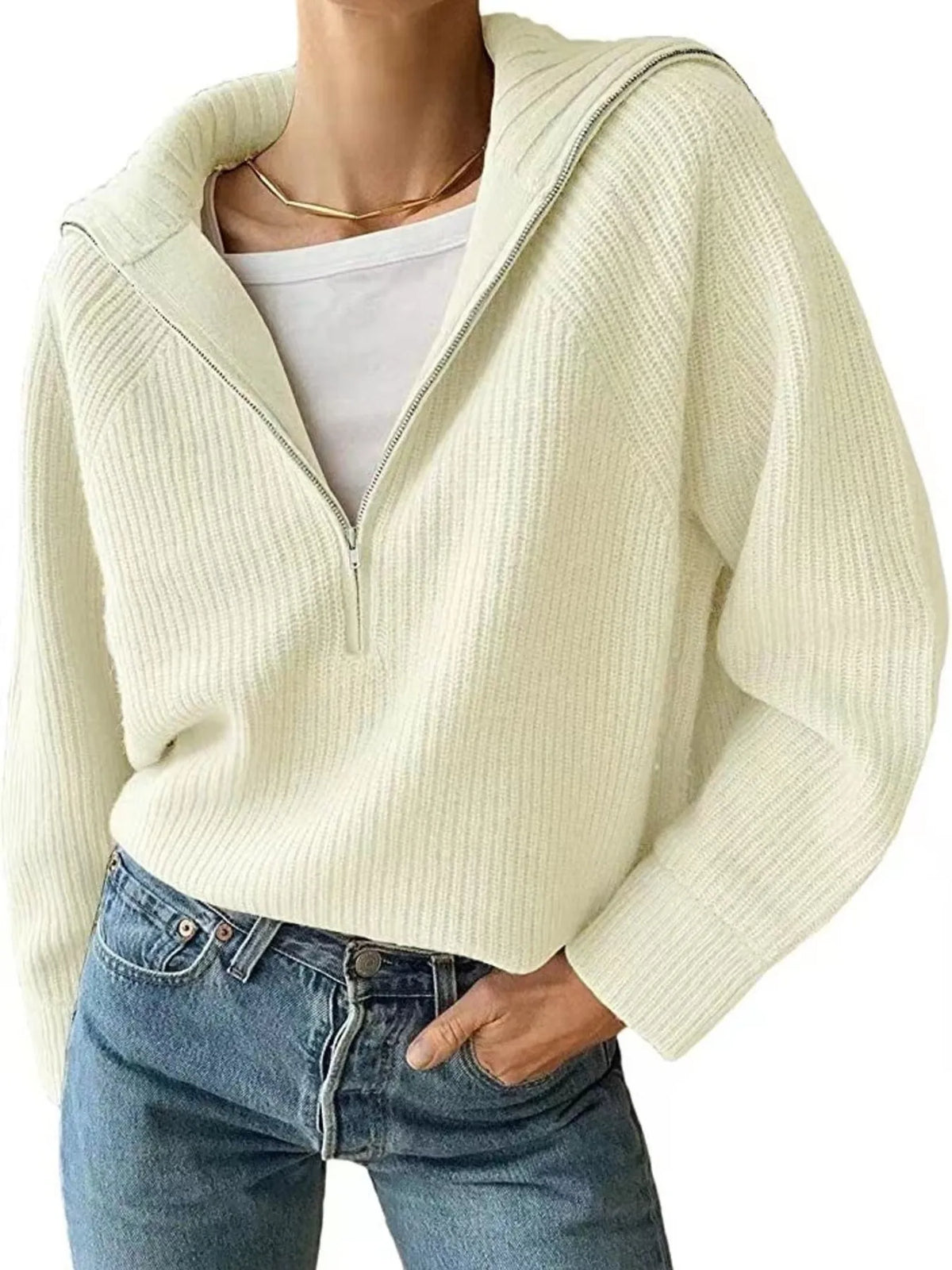 Half-zip long-sleeve ribbed sweater with a high collar.