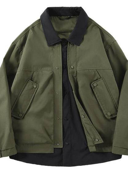 Olive jacket with black contrast panels, front view.