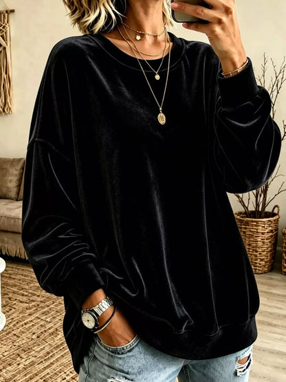 Velvet crewneck sweatshirt — Black front view. One sweatshirt only; jewellery and jeans are styling items, not included.