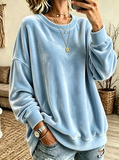 Velvet crewneck sweatshirt — Sky Blue front view. One sweatshirt only; jewellery and jeans are styling items, not included.