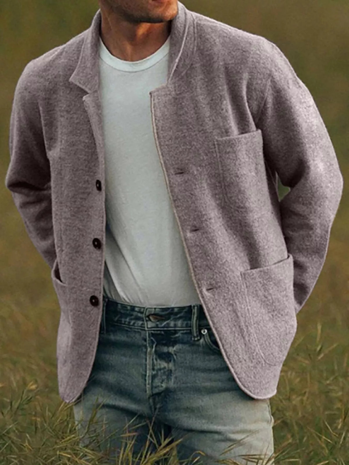 Mocha men's textured button-up jacket with a notched collar and patch pockets, worn over a separate T-shirt and jeans.