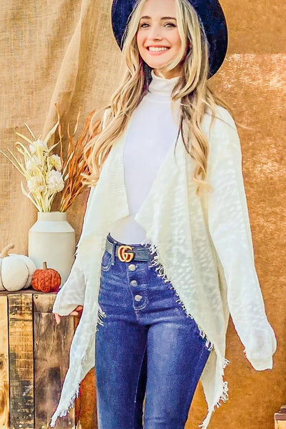 Ivory And The Why textured knit fringe-hem cardigan — knit and fringe detail