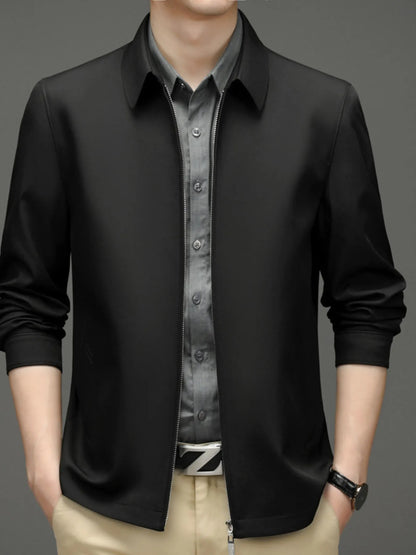 Black zip-front jacket, styled front view