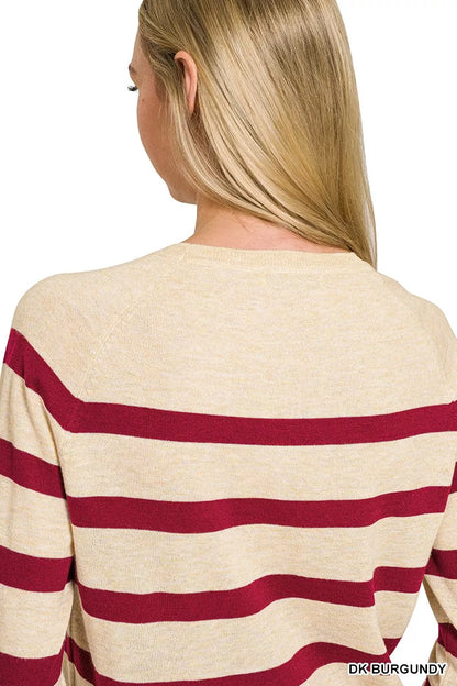 Back view of the oatmeal-and-burgundy striped Zenana sweater with long sleeves and ribbed hem.