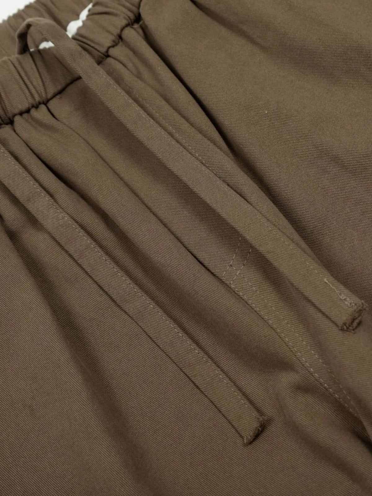 Olive brown men's wide-leg drawstring trousers — drawstring close-up