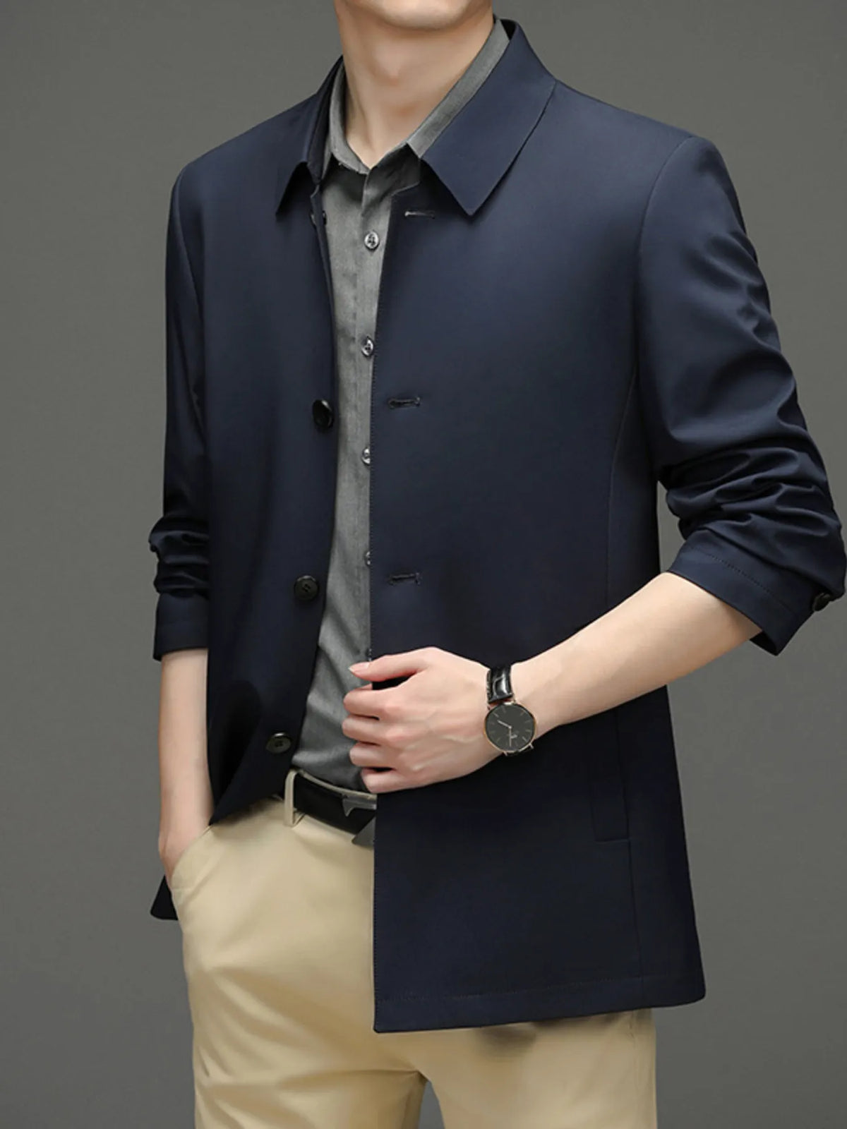 Navy Blue button-front jacket with a pointed collar, shown over a separate shirt and trousers; belt and watch are not included.