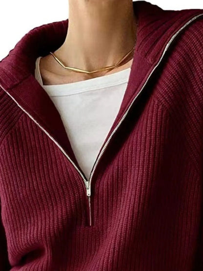 Half-zip long-sleeve ribbed sweater with a high collar.