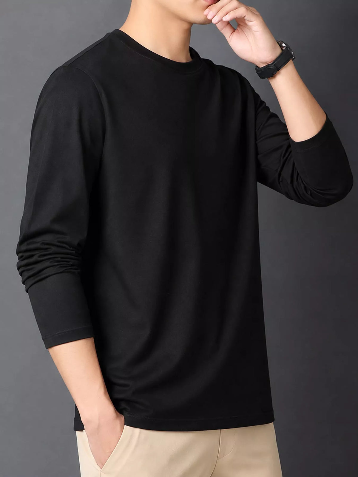 Black men's cotton long-sleeve crewneck tee, front view.
