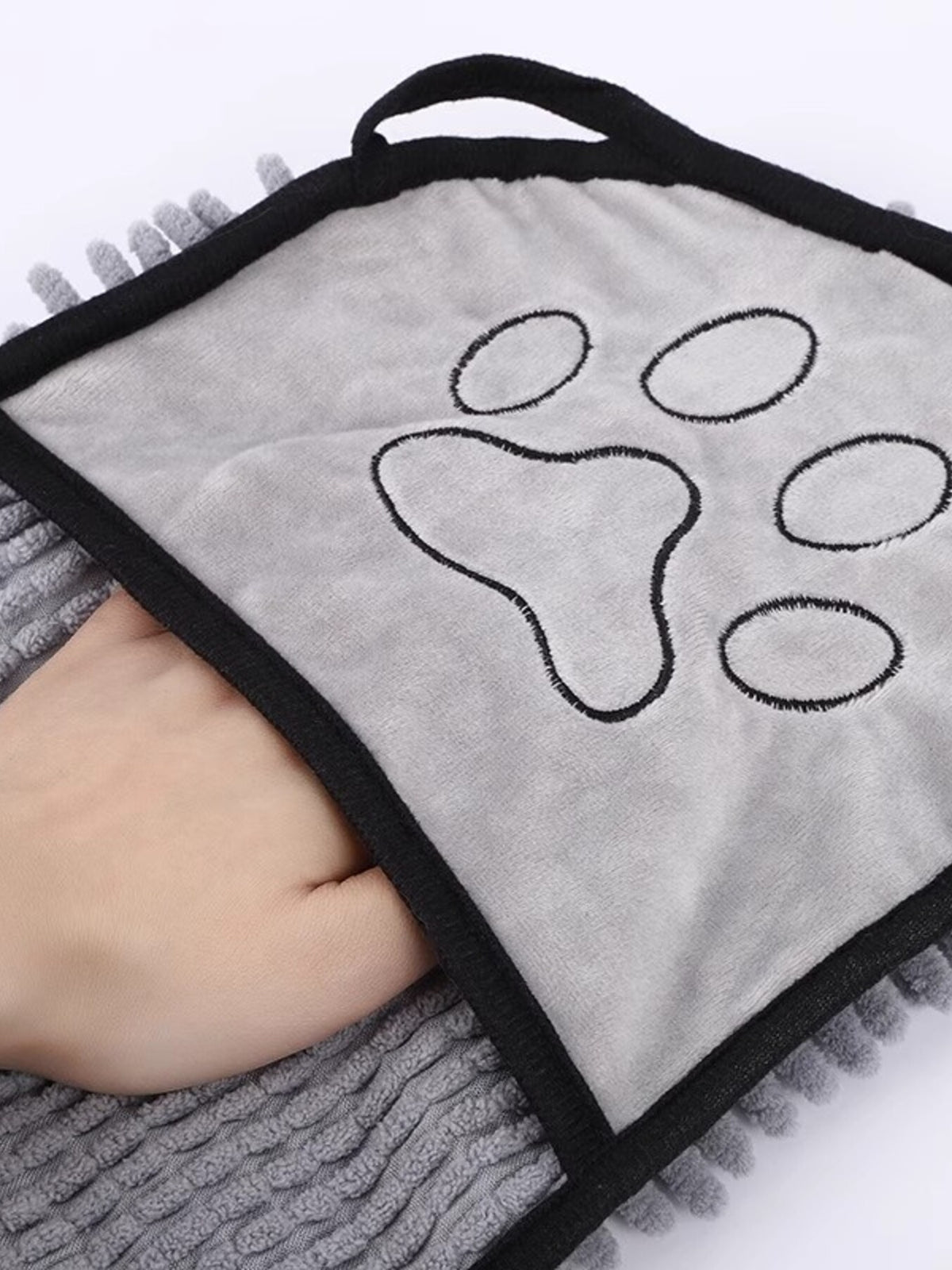 Gray paw-print towel hand pocket close-up