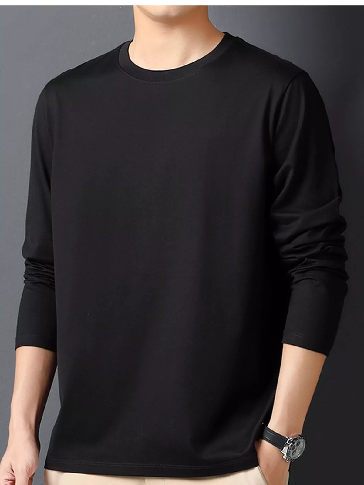 Black men's cotton long-sleeve crewneck tee, front view.