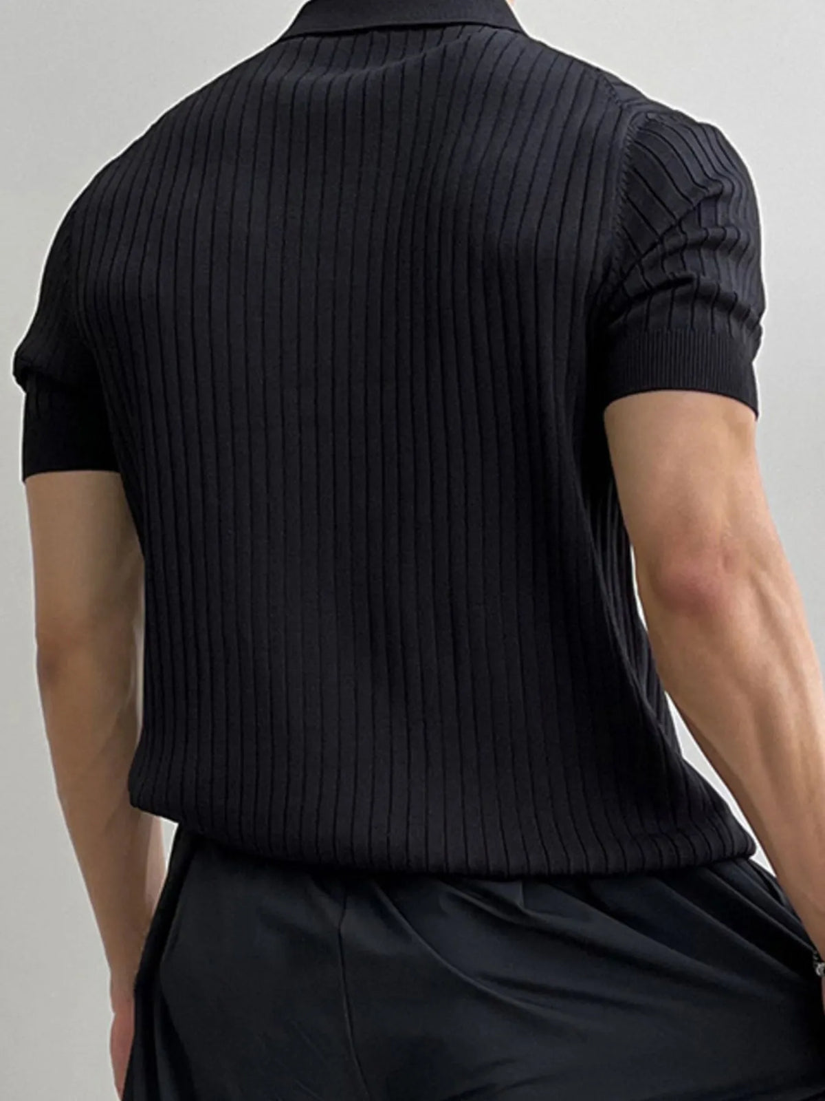 Men's Black ribbed knit polo, back view