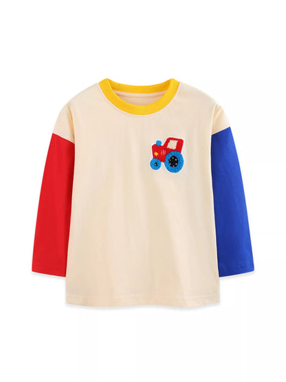 Front view of the children's cream tractor applique sweatshirt, shown on its own with red and blue sleeves and a yellow neckline.