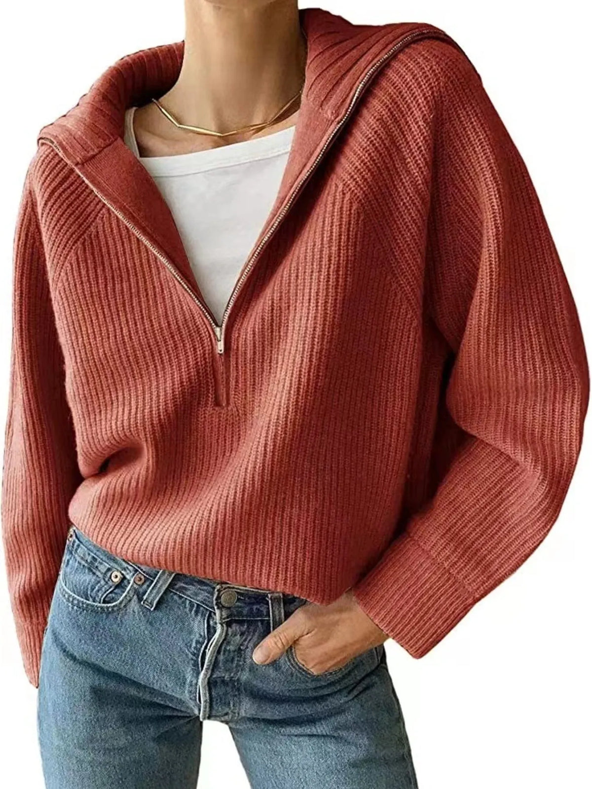 Half-zip long-sleeve ribbed sweater with a high collar.
