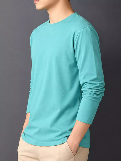 Pastel Blue men's cotton long-sleeve crewneck tee, side view.