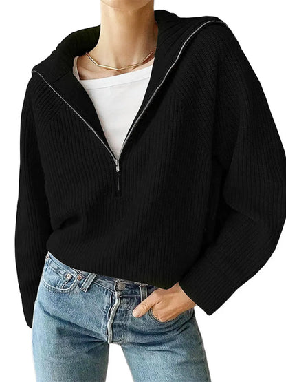 Half-zip long-sleeve ribbed sweater with a high collar.