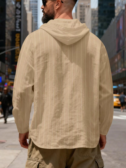 Men's striped Henley hoodie in Khaki — back view showing the hood and vertical stripe pattern; trousers and accessories are styling only.