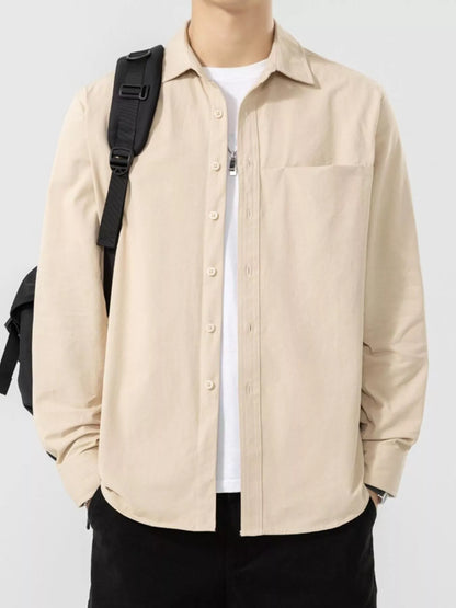 Beige long-sleeve shirt shown open from the front with a black bag; shirt sold separately.