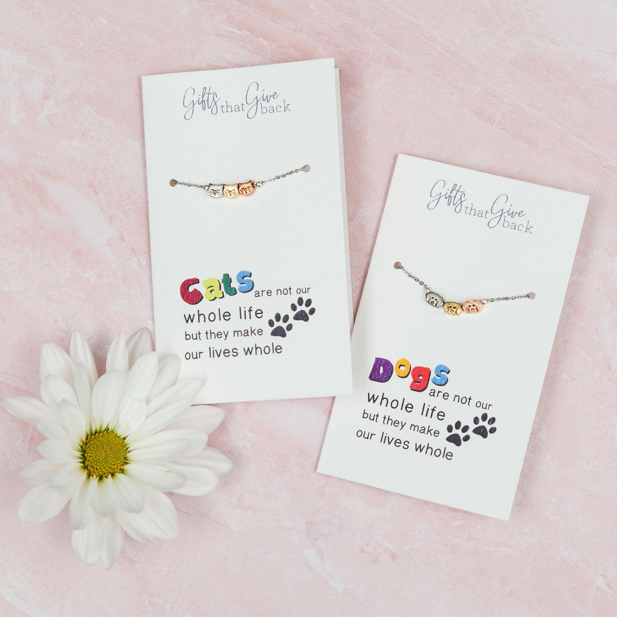Dog and cat charm bracelets shown with flowers for comparison; this listing includes one Dog-design bracelet only, not the cat bracelet or flowers.
