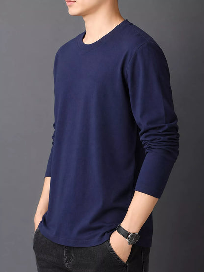 Navy men's cotton long-sleeve crewneck tee, side view.