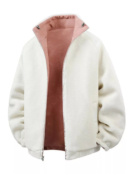 Pink jacket lining view showing the contrasting fleece surface, zip front and stand collar.