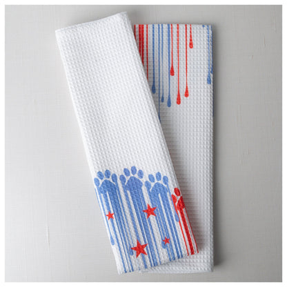 Folded Painted Paws cotton kitchen towel.