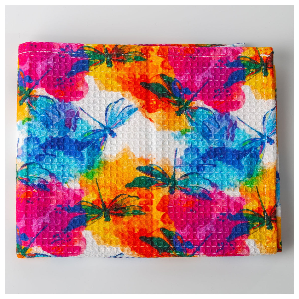 Dragonflies print towel folded flat.