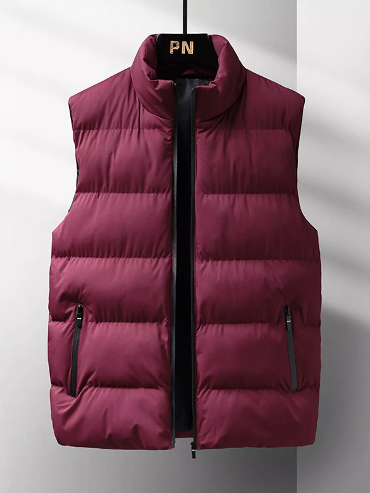 Burgundy men's lightweight zip-up puffer vest — front view