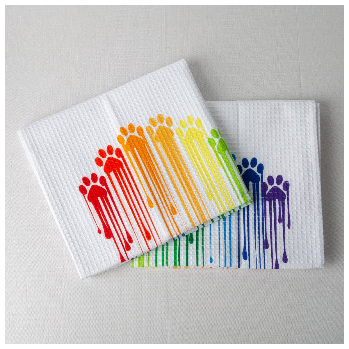 Two Rainbow Paws cotton kitchen towels.
