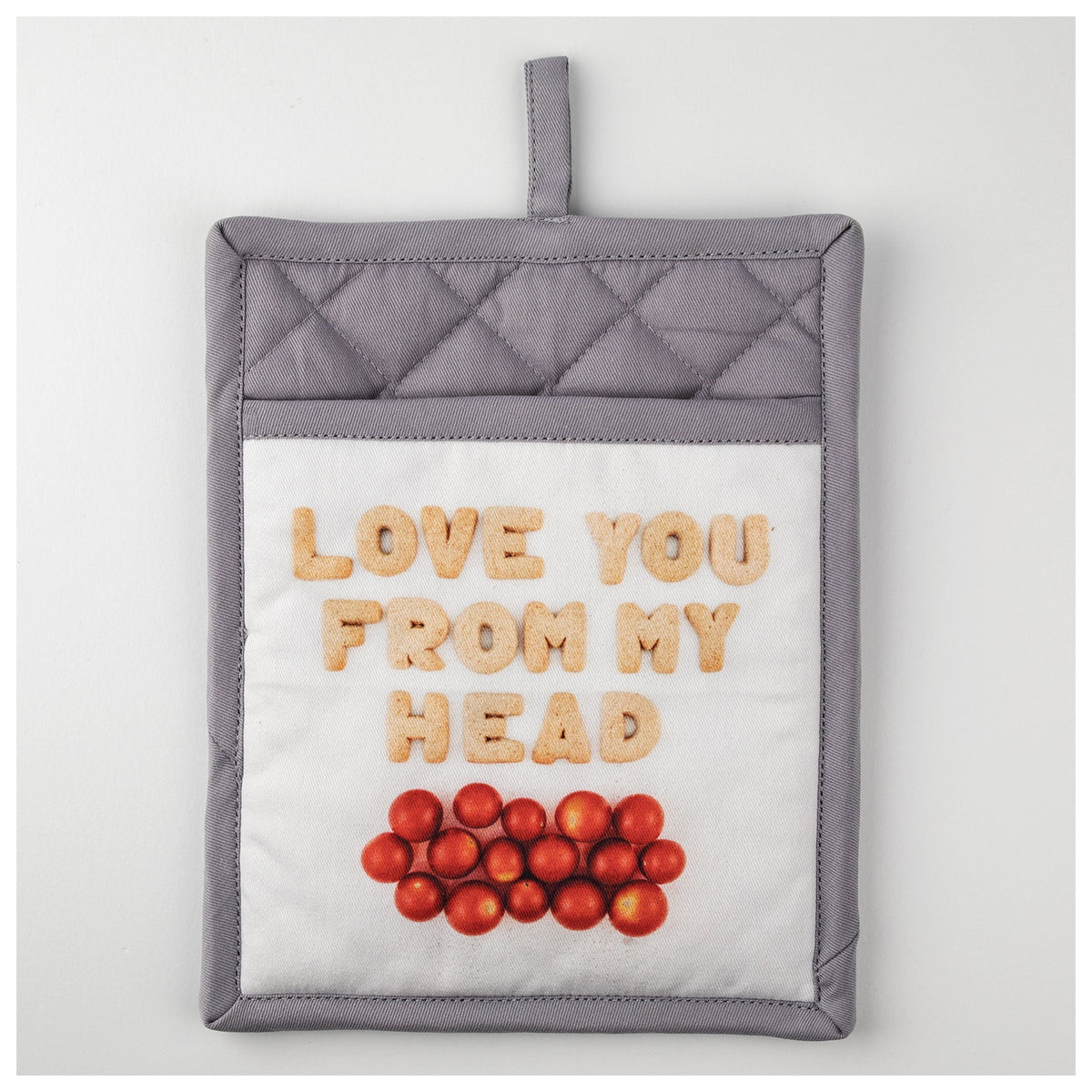 Tomatoes-design pot holder with gray trim and a playful food pun.