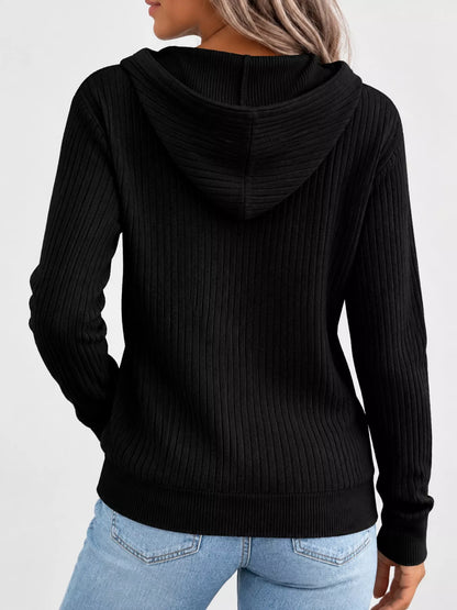 Back view of the black ribbed zip-front hooded cardigan with long sleeves.