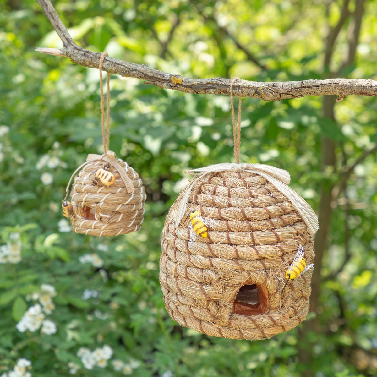 Small and large decorative beehive-shaped birdhouses hanging together for size comparison. One selected size per order.