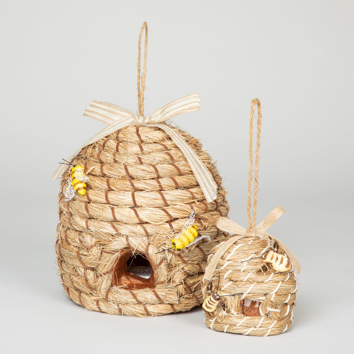 Large and small decorative beehive-shaped birdhouses shown together for size comparison. One selected size per order.