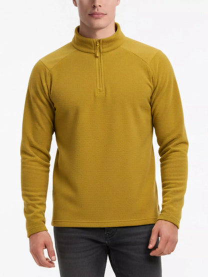 Mustard half-zip sweatshirt on a model, cropped front view; sweatshirt only