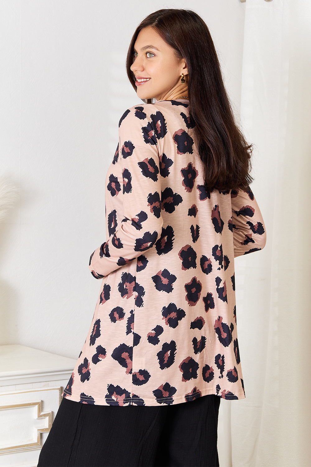 Back view of the Double Take leopard-print longline cardigan.