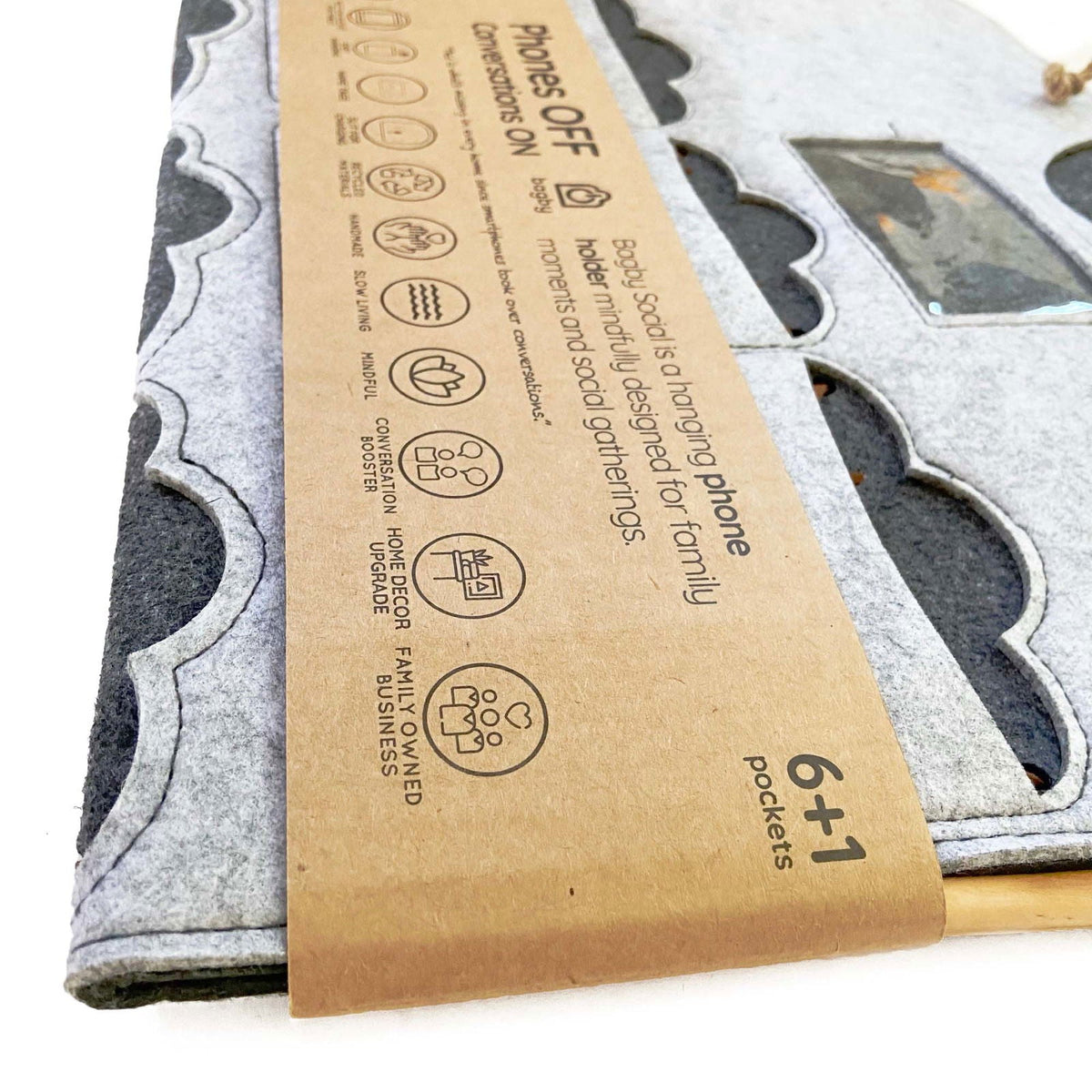 Close view of the Bagby FAMILY original paper sleeve and felt organizer